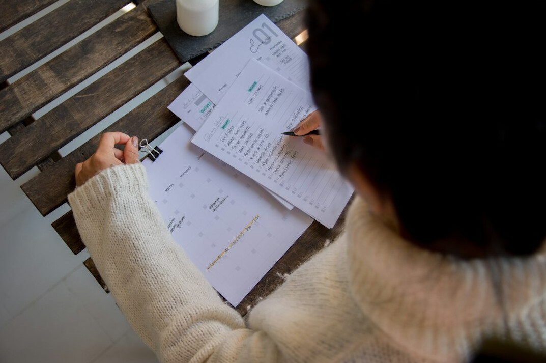 person reviewing financial reports