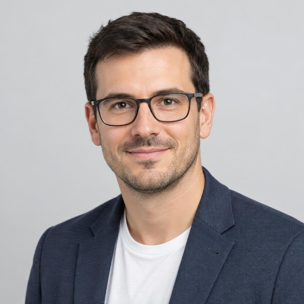 Studio portrait of a Swiss man data journalist in his thirties